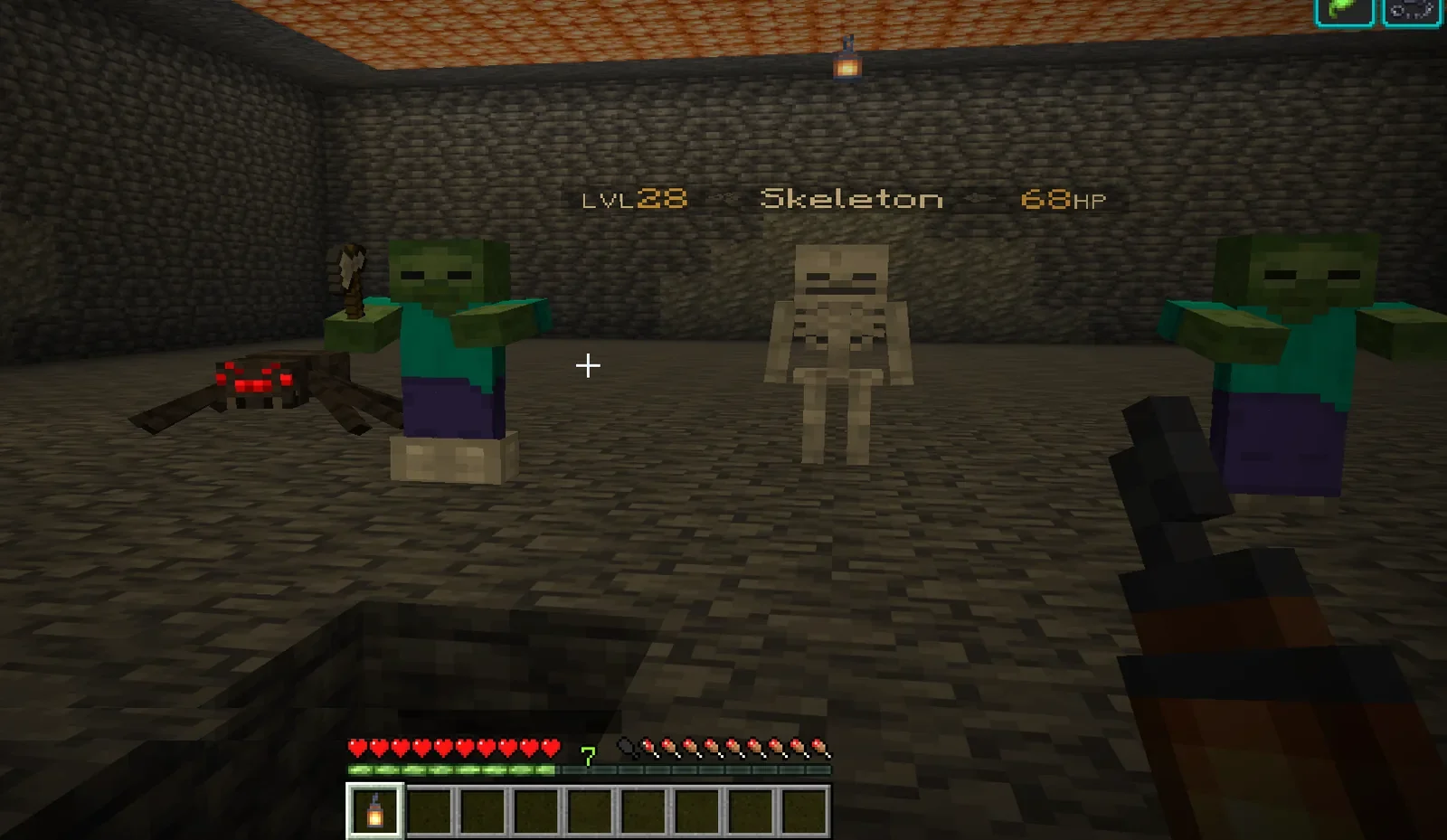 A zombie, a skeleton and a spider in a cave; the skeleton shows LVL28 Skeleton 68HP